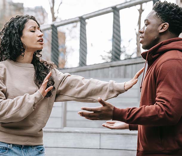 A couple having conflict on street