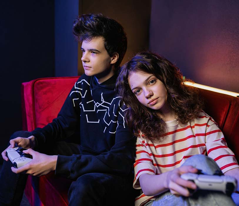 A man and a woman playing video games