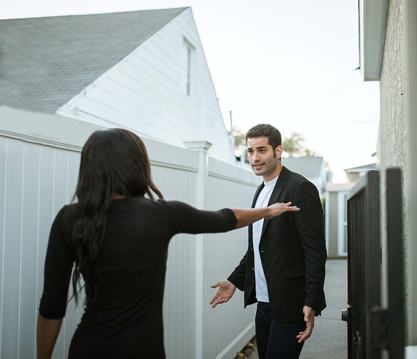 A man in black long sleeve shirt and woman in black long sleeve shirt