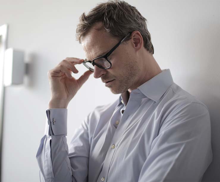 A photo of man wearing black eyeglasses