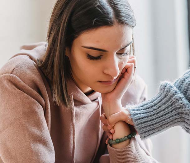 sad-woman-with-anonymous-female