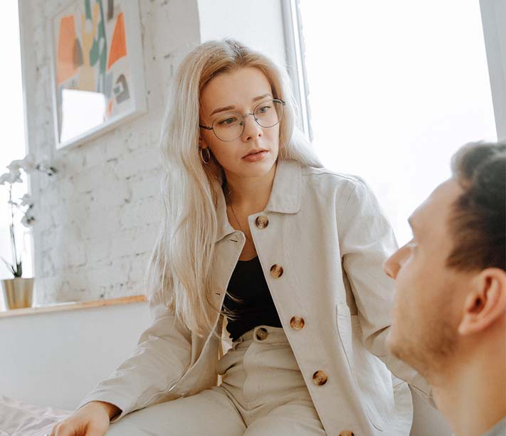 A woman listening to her boyfriend