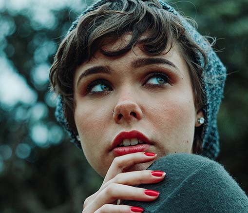 closeup photo of woman wearing beanie