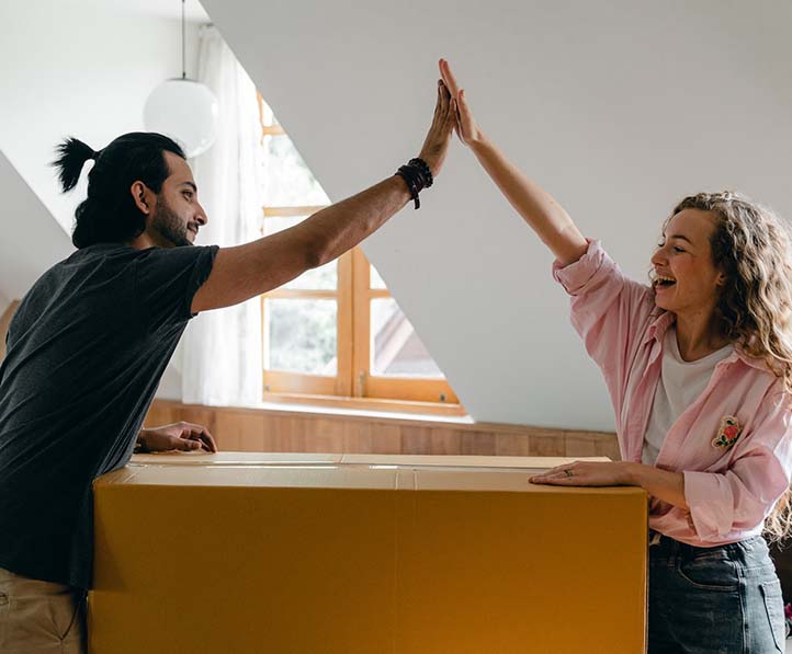 exited diverse couple relocating in new apartment