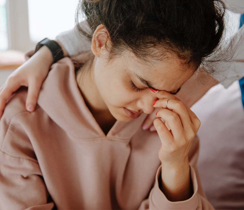 therapist comforting patient